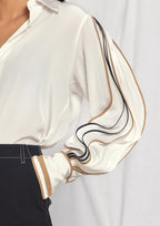 Shirt with pleated sleeves in multi-colour binding
