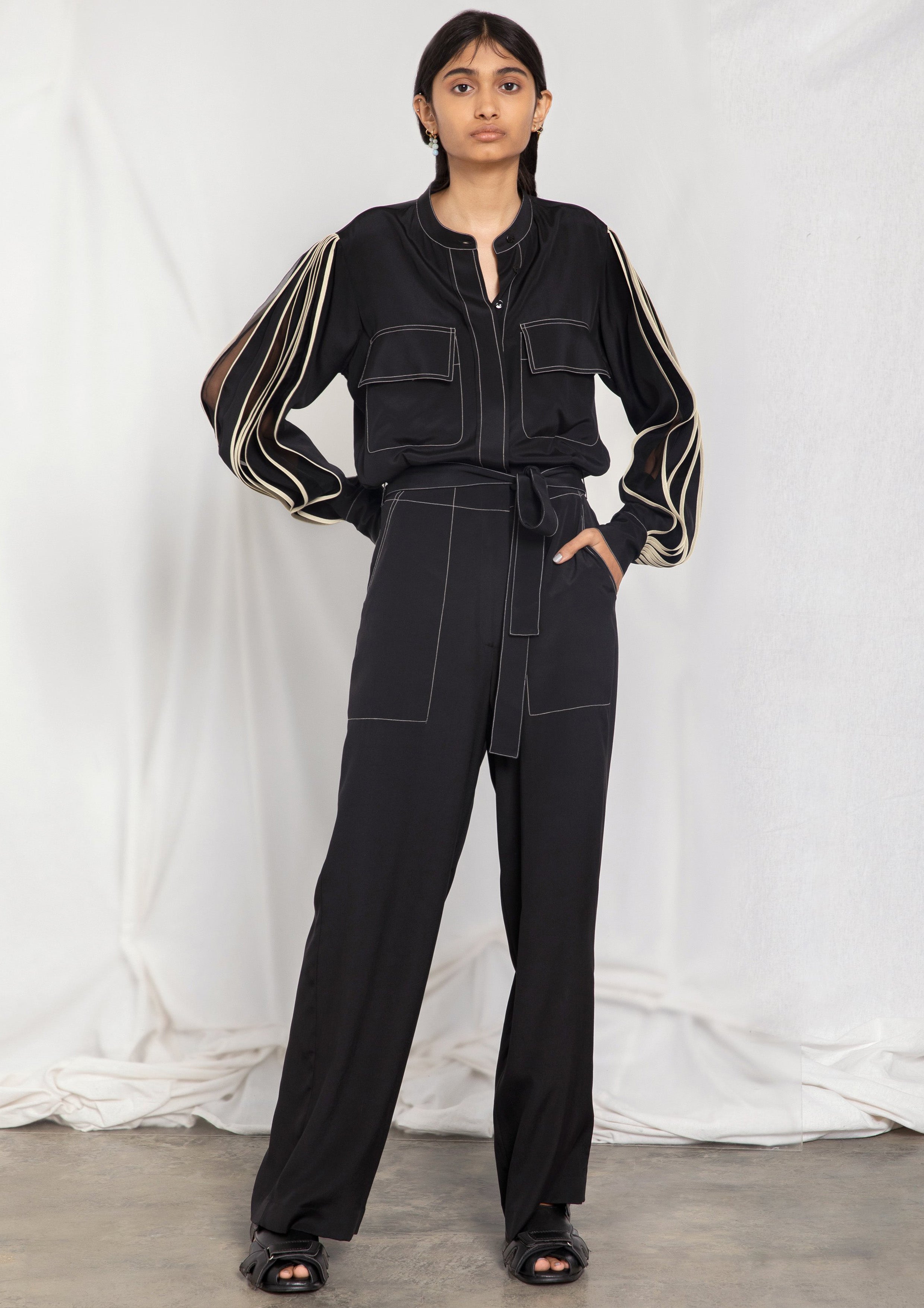 Jumpsuit with pleated sleeves