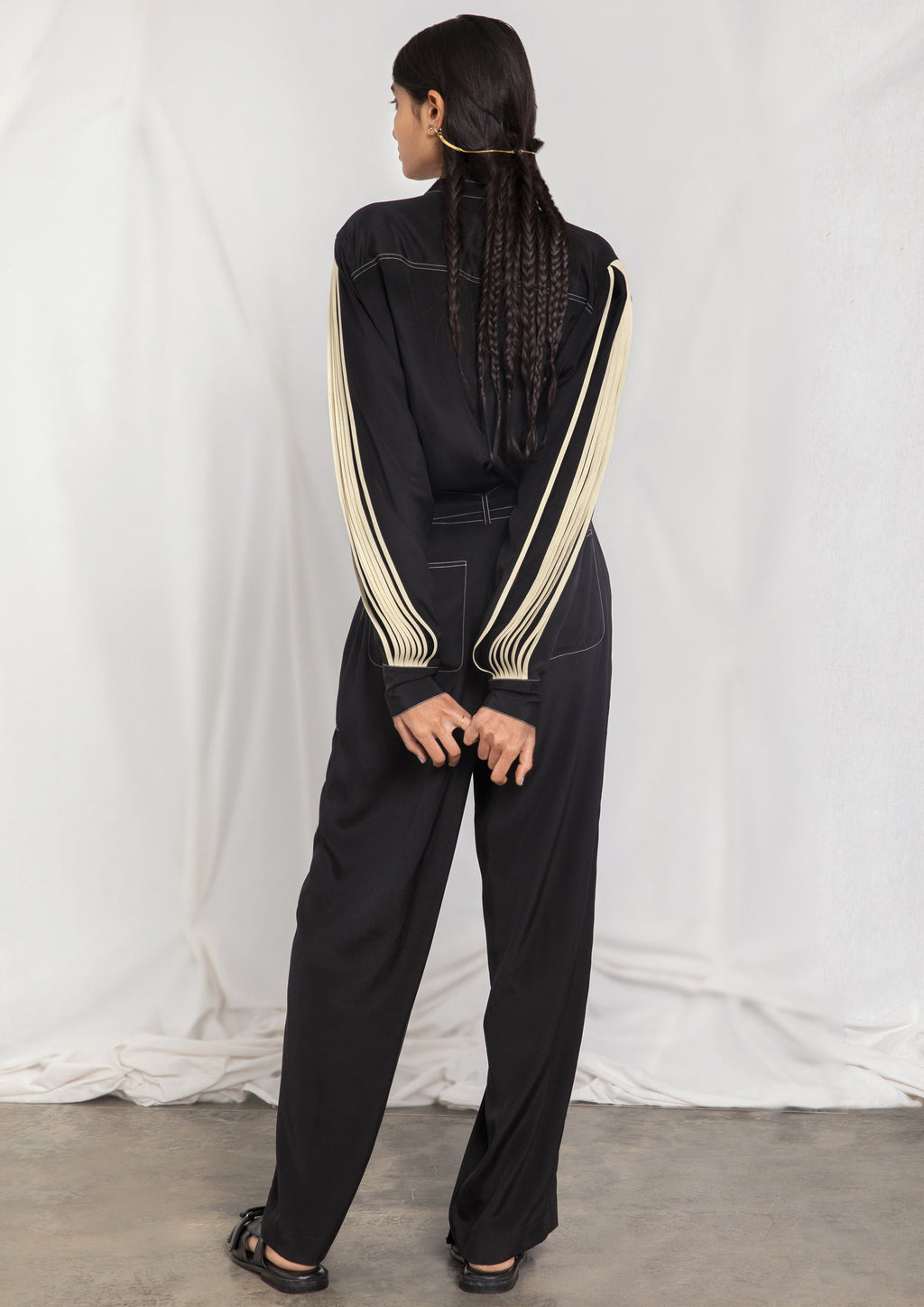 Jumpsuit with pleated sleeves