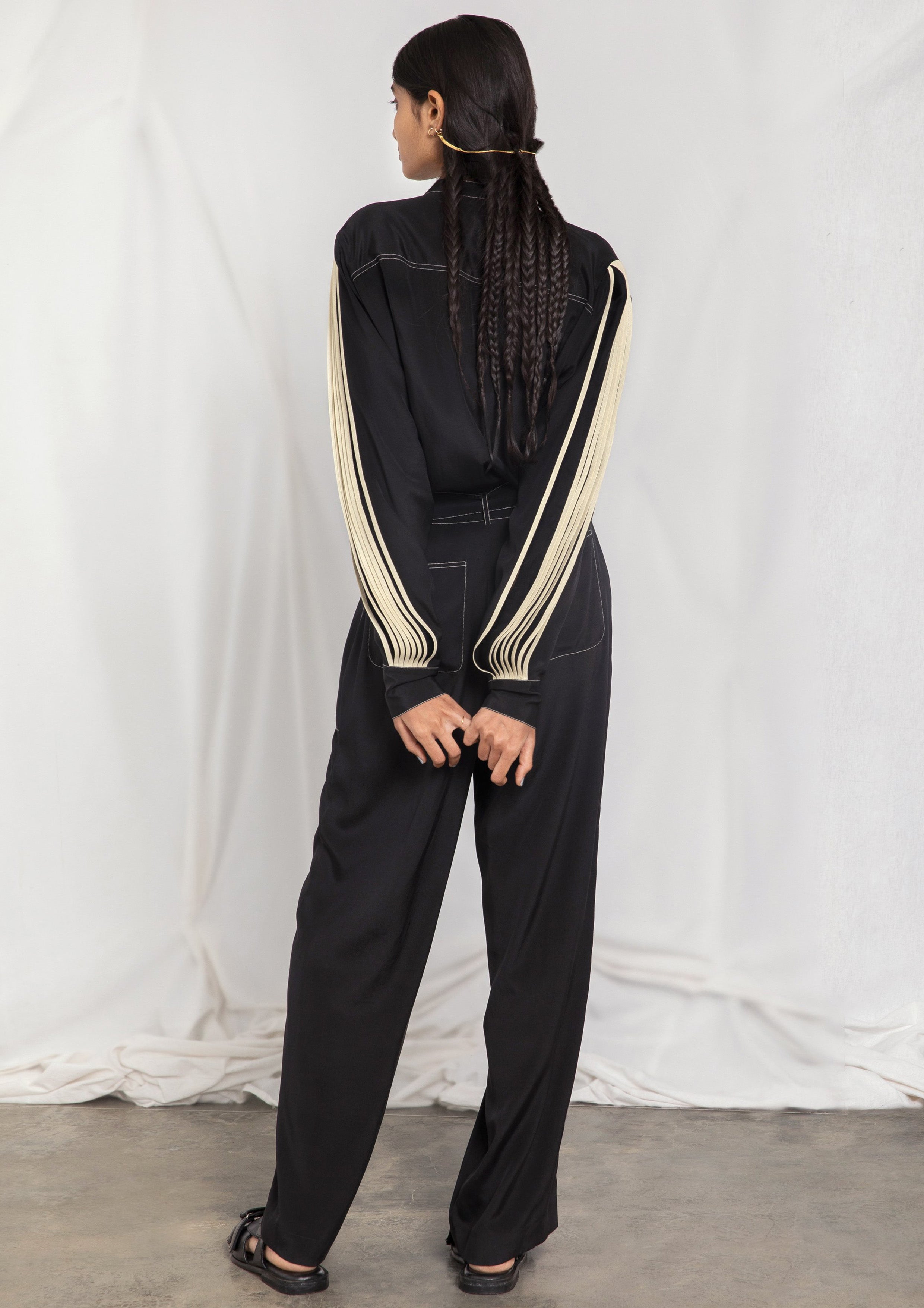 Jumpsuit with pleated sleeves