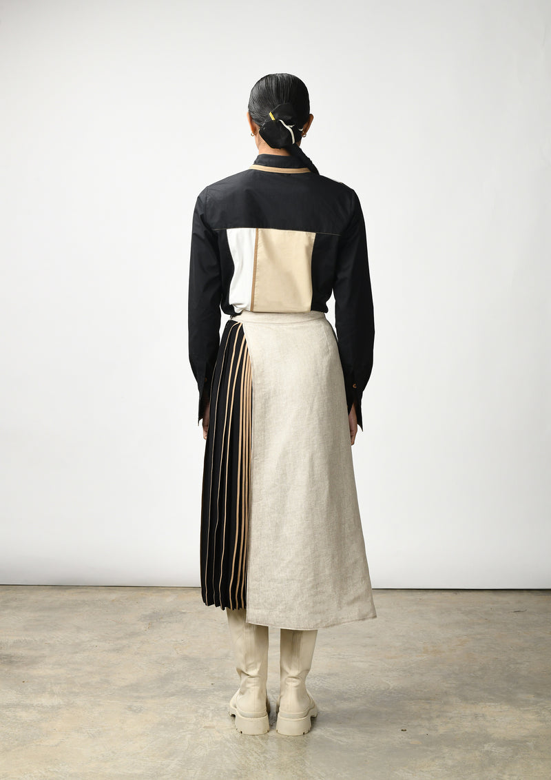 Asymmetrical skirt with binding detail