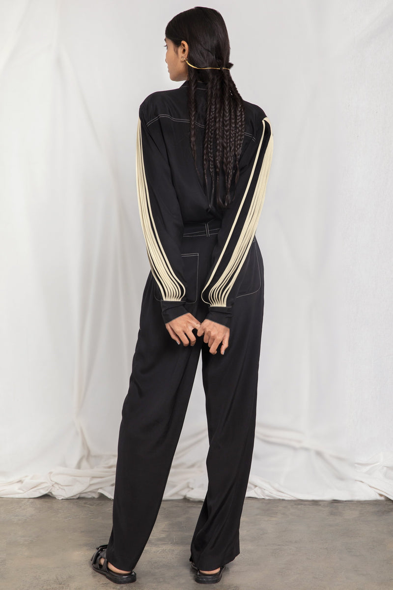 Jumpsuit with pleated sleeves