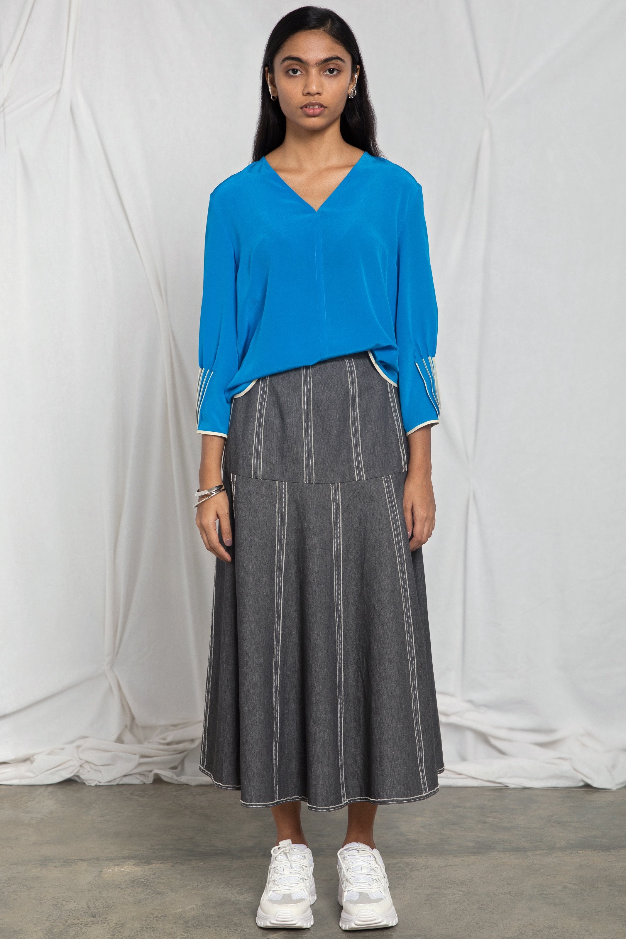 V-neck top with cuff binding detail