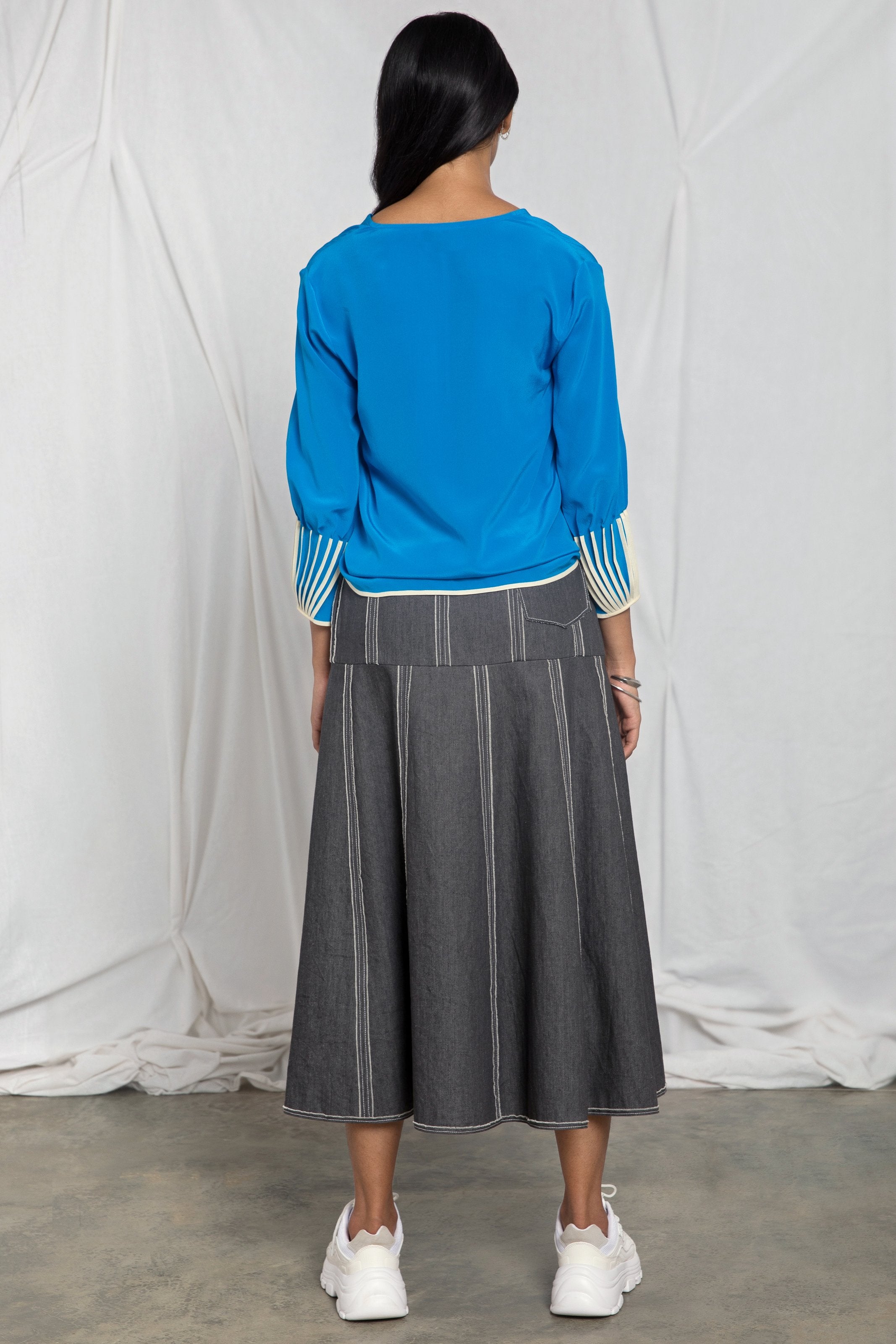 V-neck top with cuff binding detail