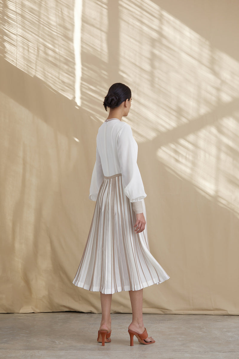 Silk dress with pleated skirt